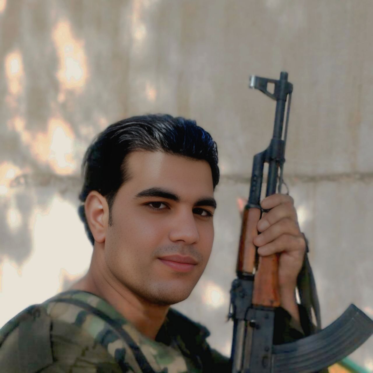 صورة الشهيد نور الدين محمد ربيع الحرستاني